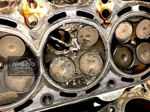 Kawasaki ZZR1400 valve head. Upon investigation & with the engine out of the ZZR1400, it transpired that a exhaust valve stem had broken on cylinder two  &  in the process it had turned itself sideways & with the immense force of such a powerful engine it had caused extensive damage to the piston & head.