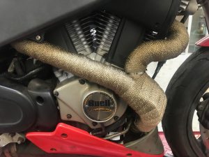 The Buell has returned for her oil change & engine tweaks as she was still pinking under load. To try & limit the excessive heat surrounding the exhaust, Daniel took the decision to fully heat wrap it.