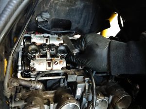  As we have mentioned before, a motorcycle has to undergo some considerable dismantling in the process of a valve clearance check.
