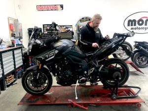 Daniel, having stripped the motorcycle & removed the battery; set about replacing earth cables which the customer had supplied to us