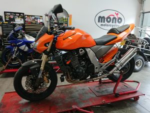 The bright orange Kawasaki Z1000 has returned to the workshop again this week, as she continues her modification journey.